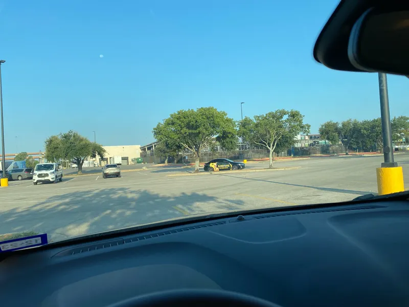Photo of DC Law Injury Lawyers car sitting whole day at Walmart parking lot