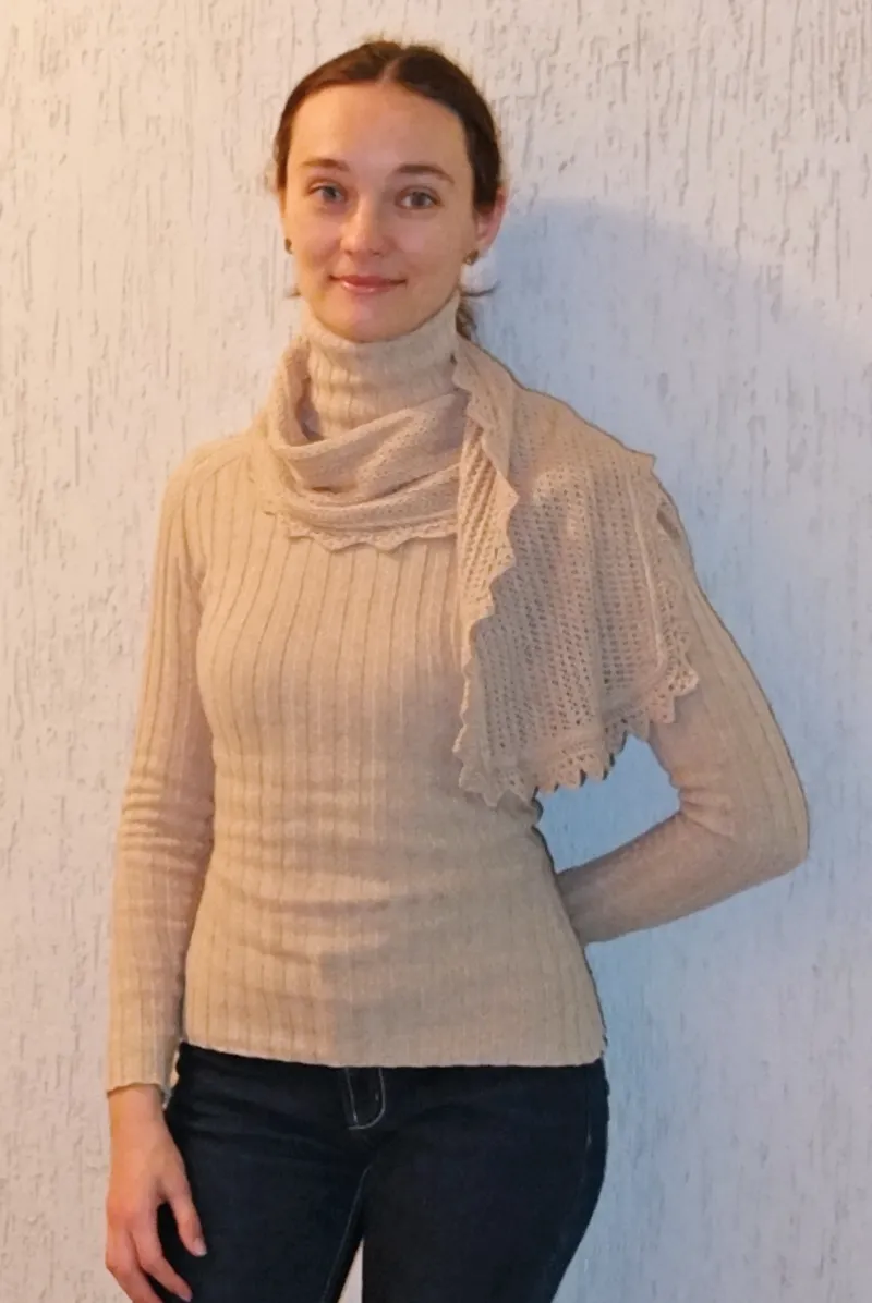 A cozy sweater and scarf set, knitted from camel wool by Olha Stefanishyna.